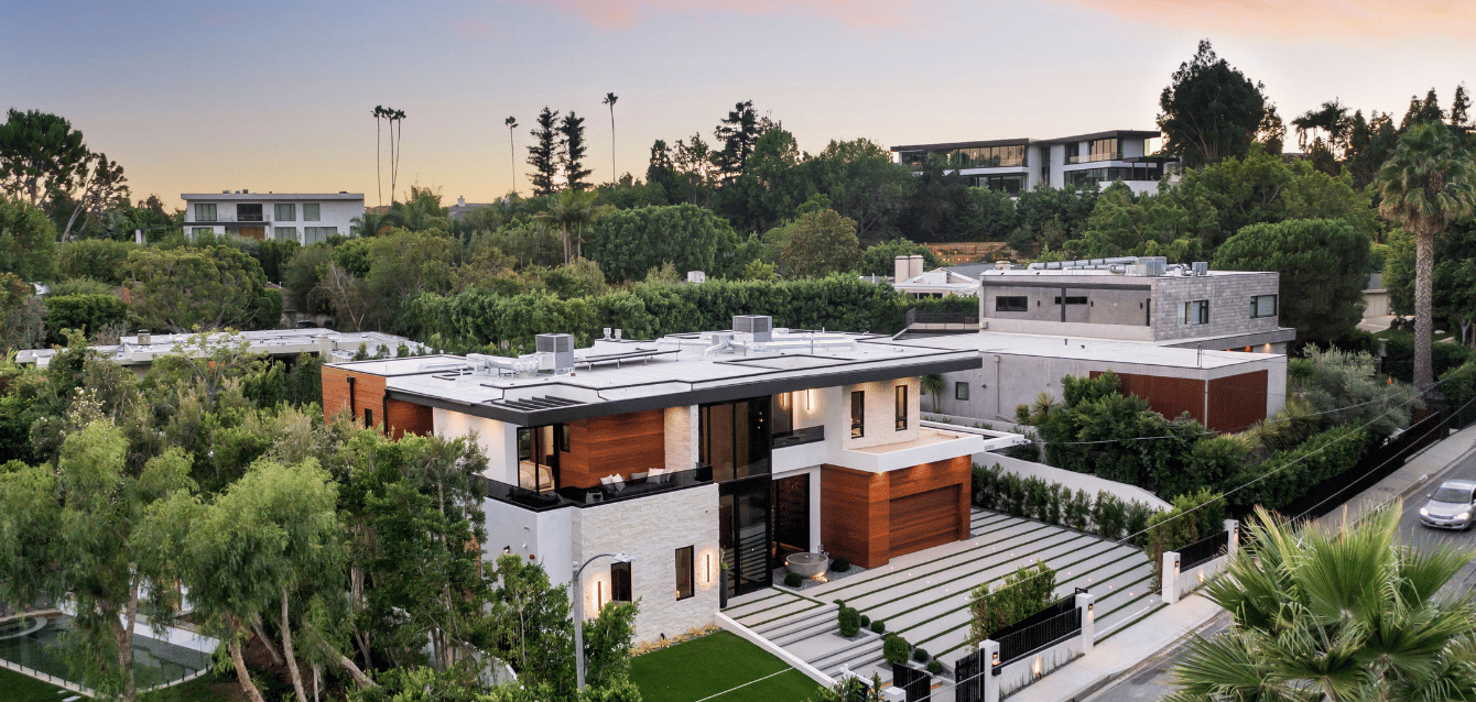 High-end Los Angeles villa in a prestigious neighborhood, surrounded by lush greenery—highlighting WaveBNB’s Google My Business and local SEO strategies to boost direct booking