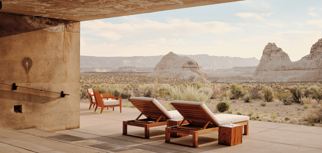 Luxury desert resort Amangiri by Aman Resorts, featuring an outdoor lounge with breathtaking canyon views—highlighting how WaveBNB helps boutique hotels maximize revenue through smart, automated u